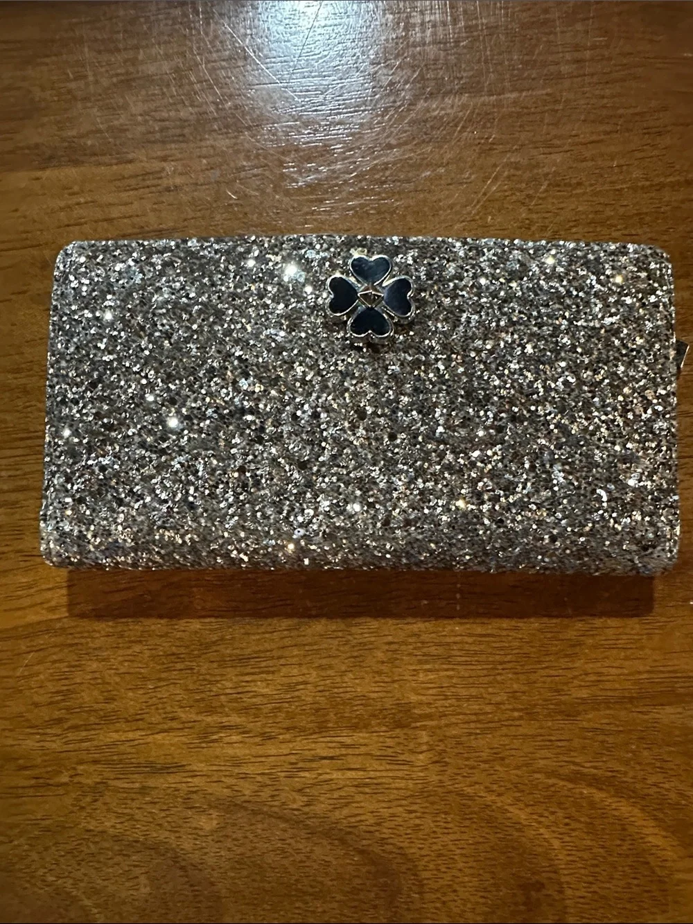 kate spade Silver Glitter Clutch with Clover Accent